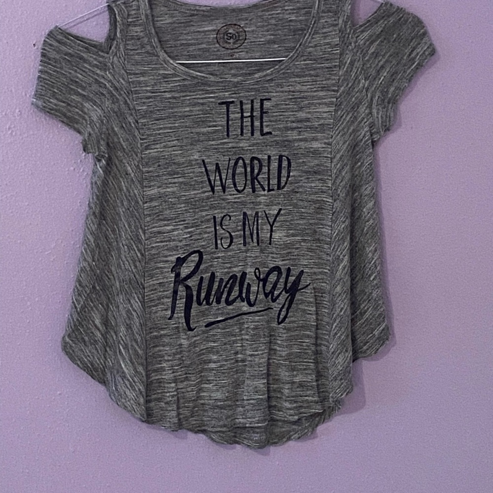 Girls gray “The World Is My Runway,” shirt with black and glittery letters